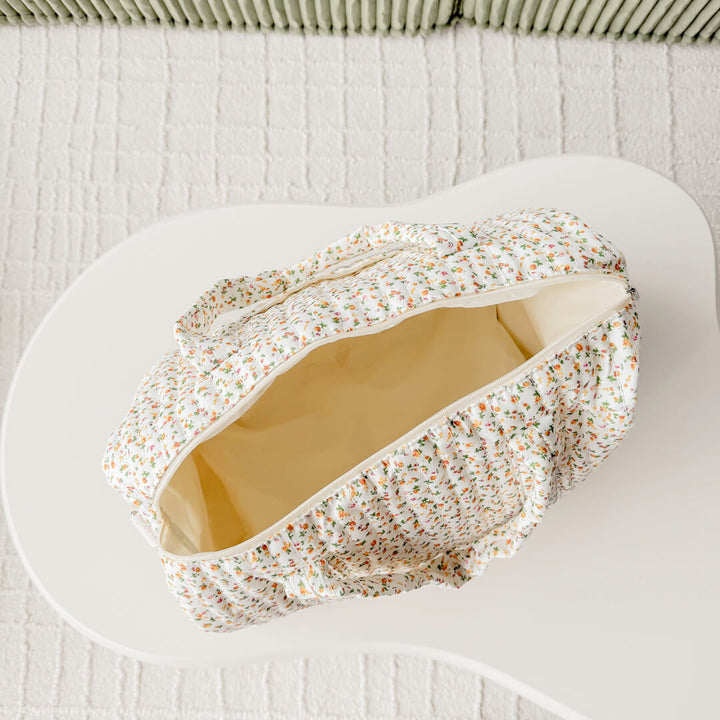 Floral overnight bag with padded quilted texture