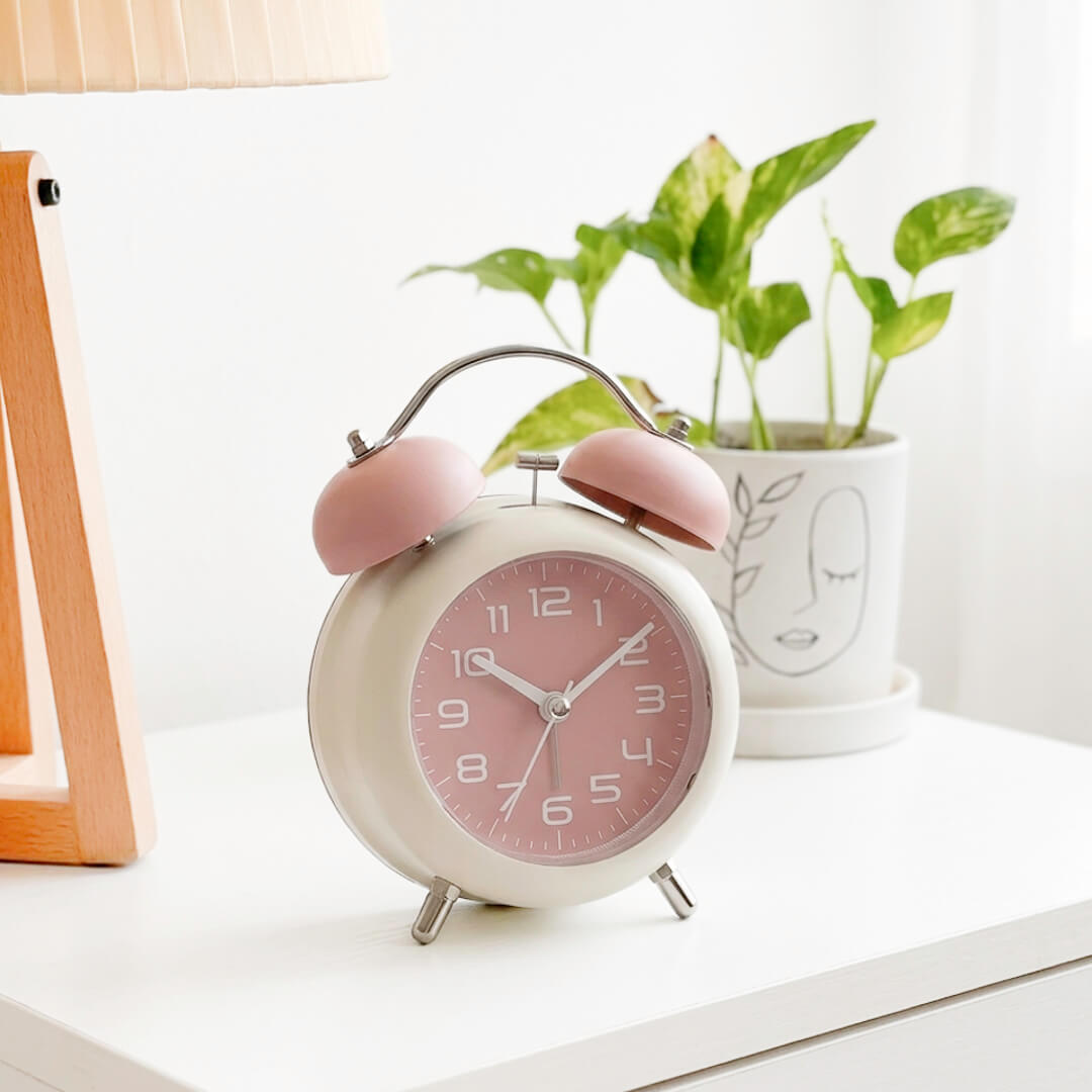Cream and pink alarm clock for bedside table