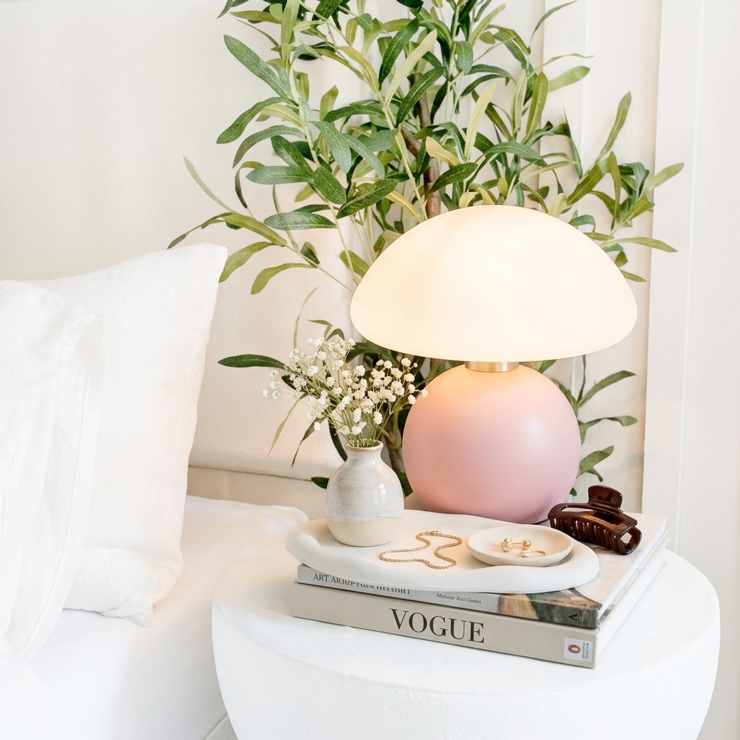 pink ceramic mushroom table lamp with warm glow