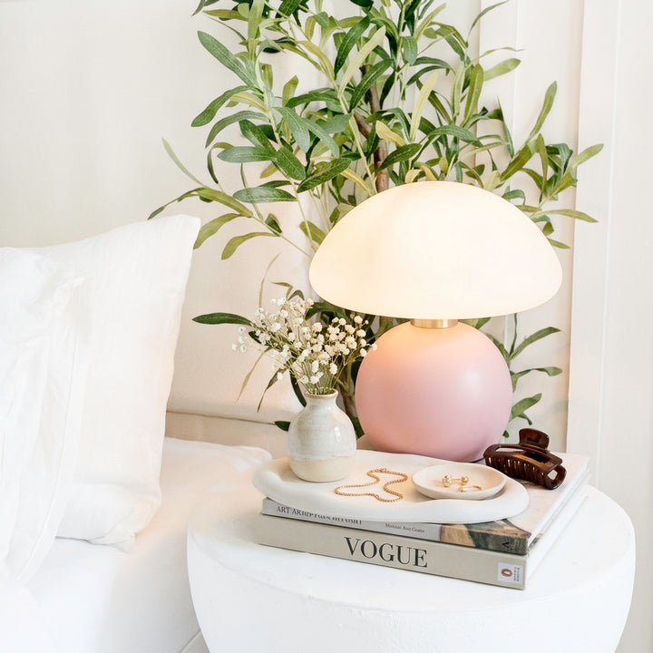 pink ceramic mushroom table lamp with warm glow