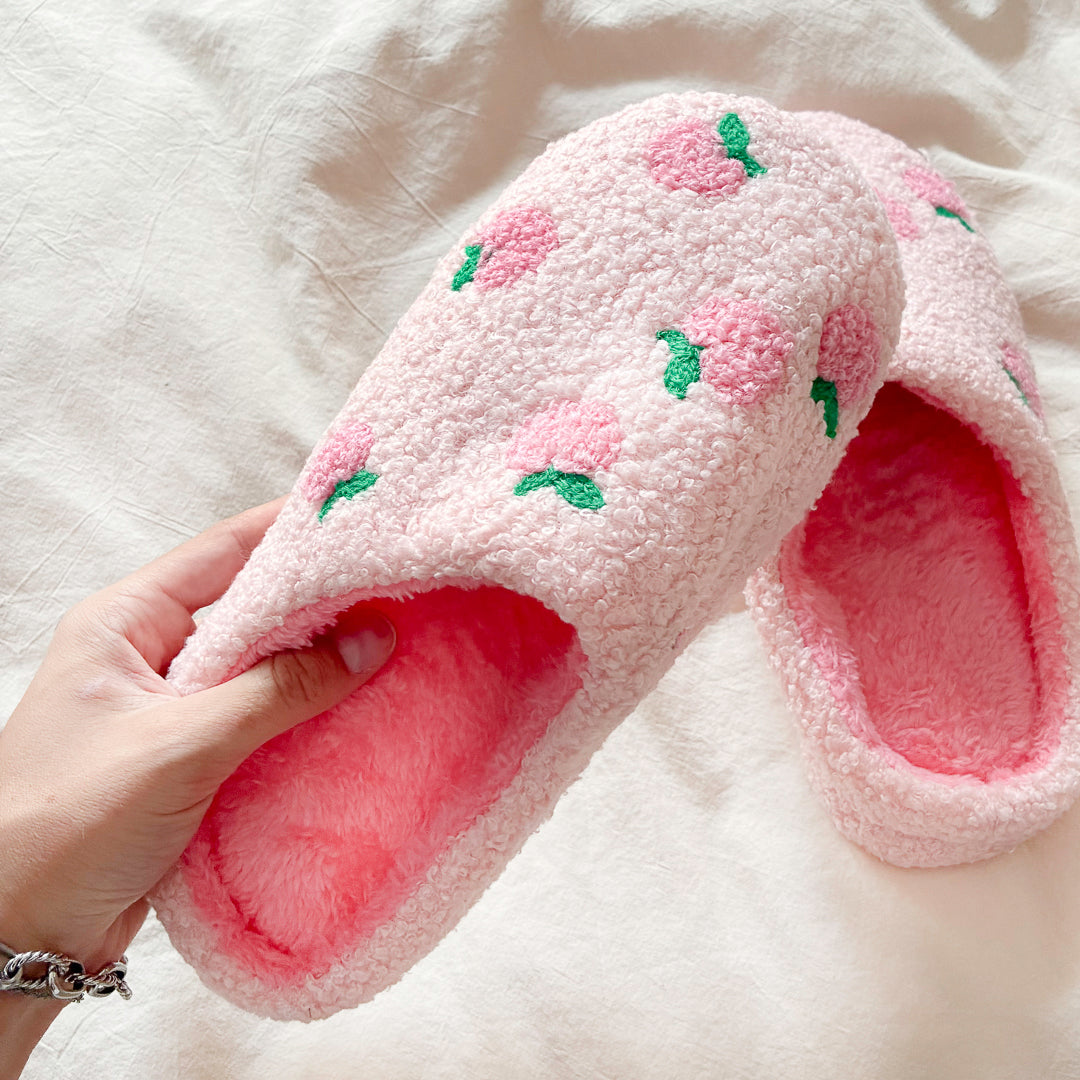 Soft slip-on slippers with pink peach details