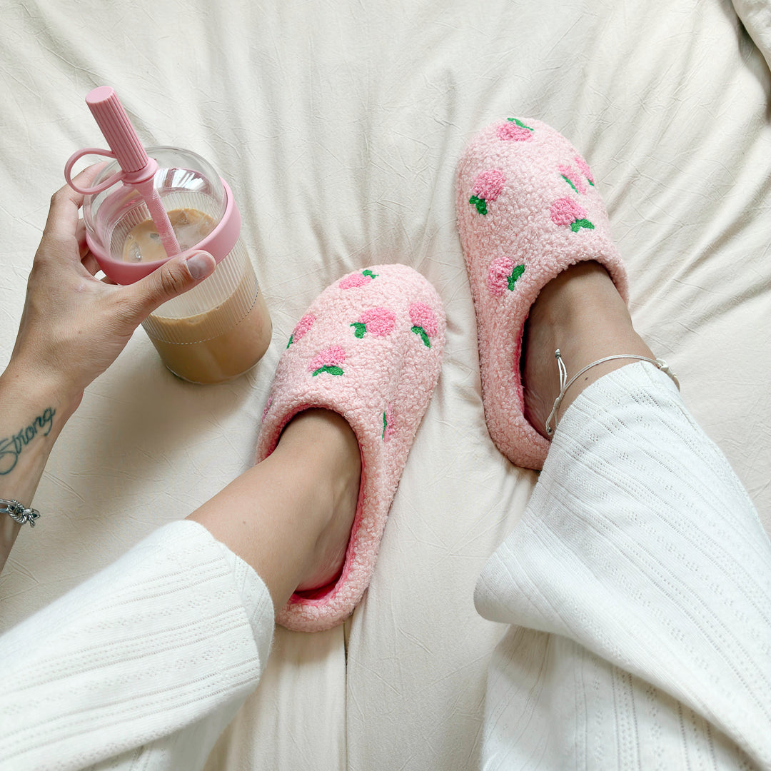 Pink indoor slippers with soft cushioned lining