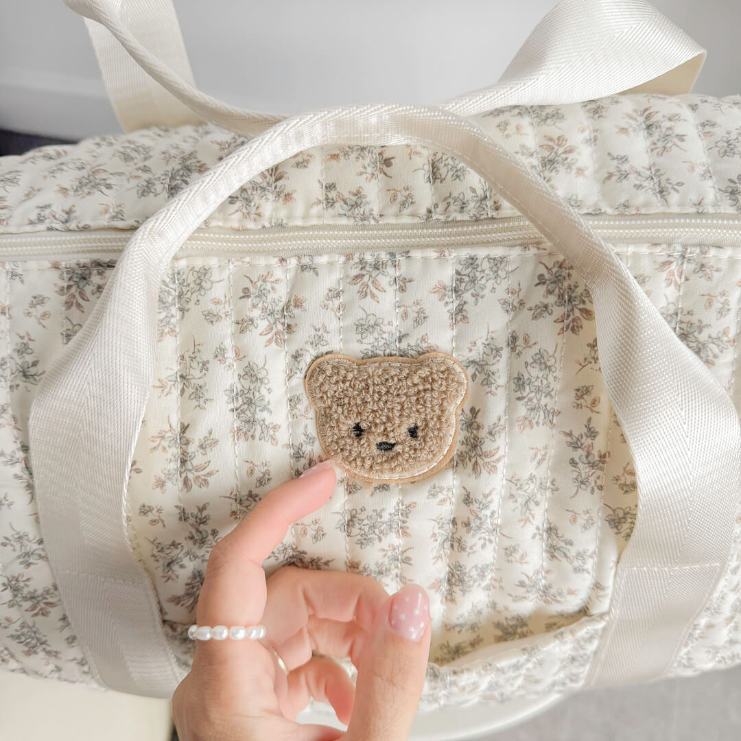 Avery floral travel bag with soft quilted texture