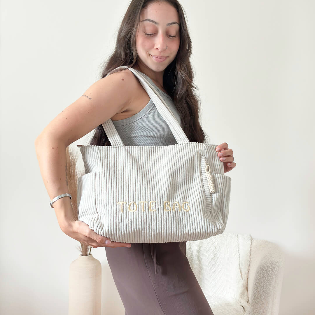 grey ribbed tote bag with roomy carryall design