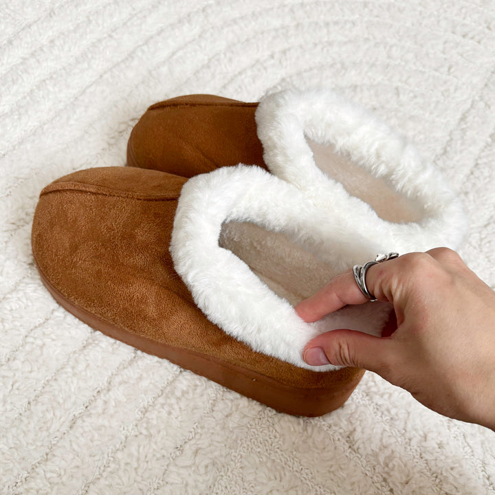 Faux fur lined boots with soft suede finish and cozy winter style