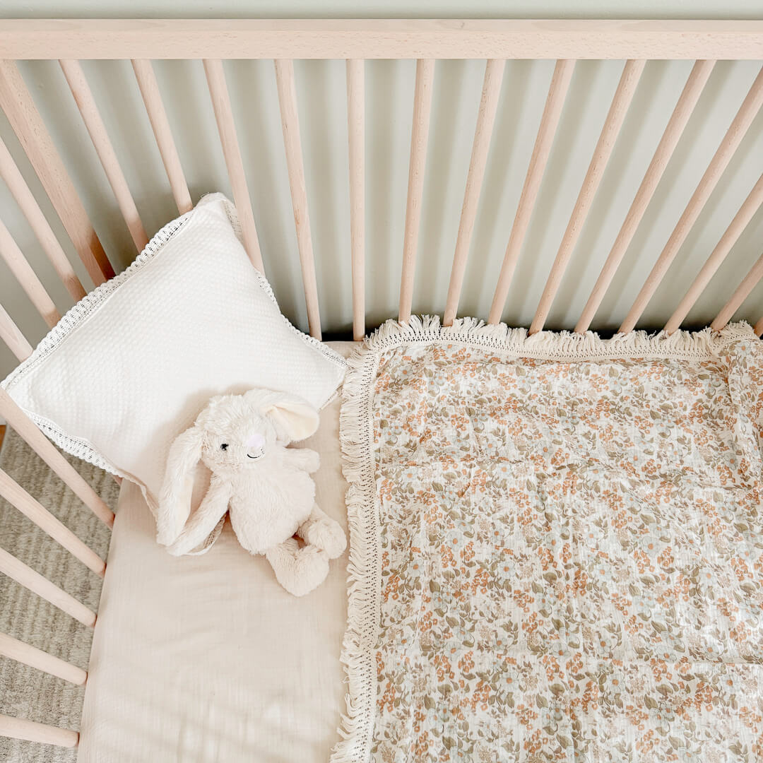 Breathable cotton baby blanket with allover floral design