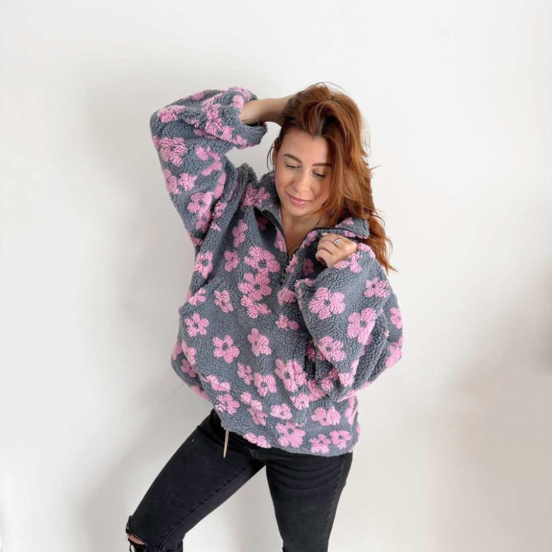 Relaxed fit half zip sweater with soft sherpa floral fabric