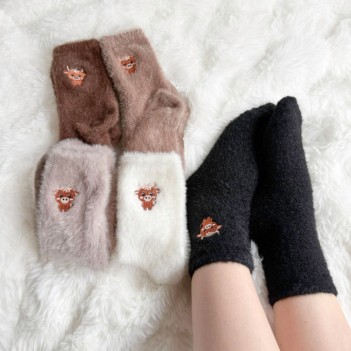 Women’s warm fuzzy socks bundle in neutral shades for winter lounging