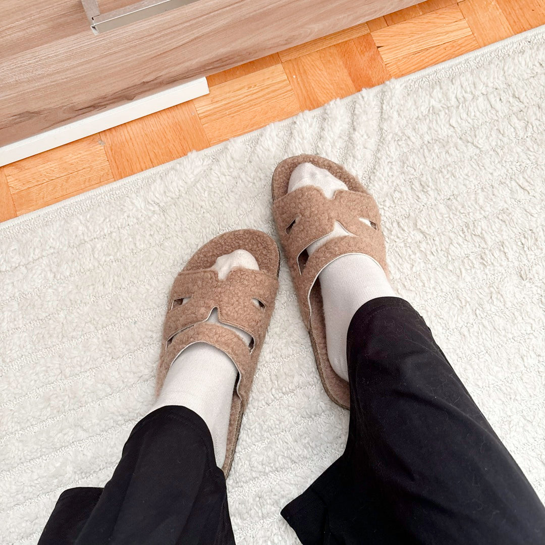 Plush slide sandals ideal for relaxed home comfort