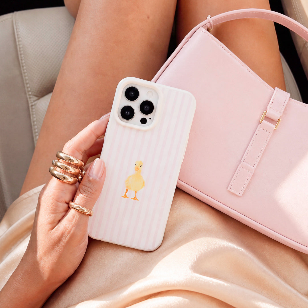 Pink and cream striped phone case with duck design