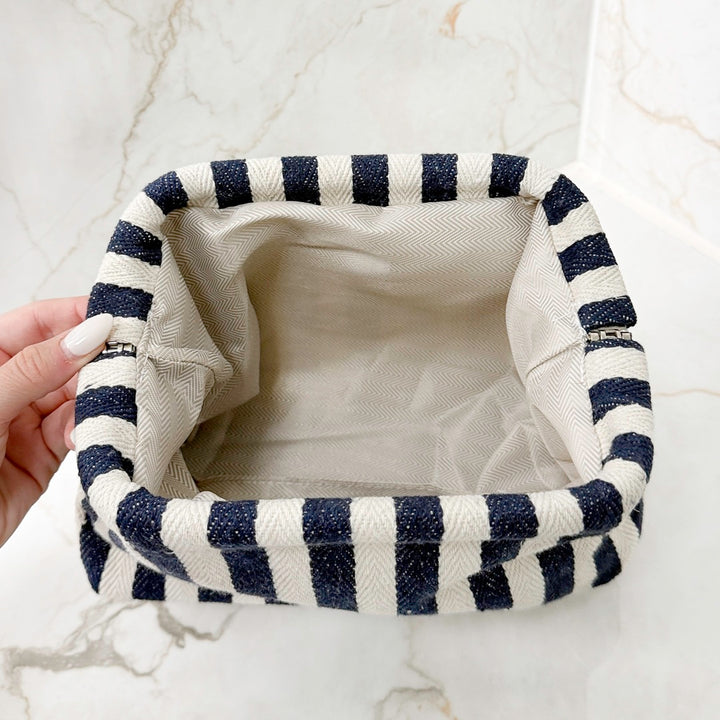 Small hand bag with stripe pattern