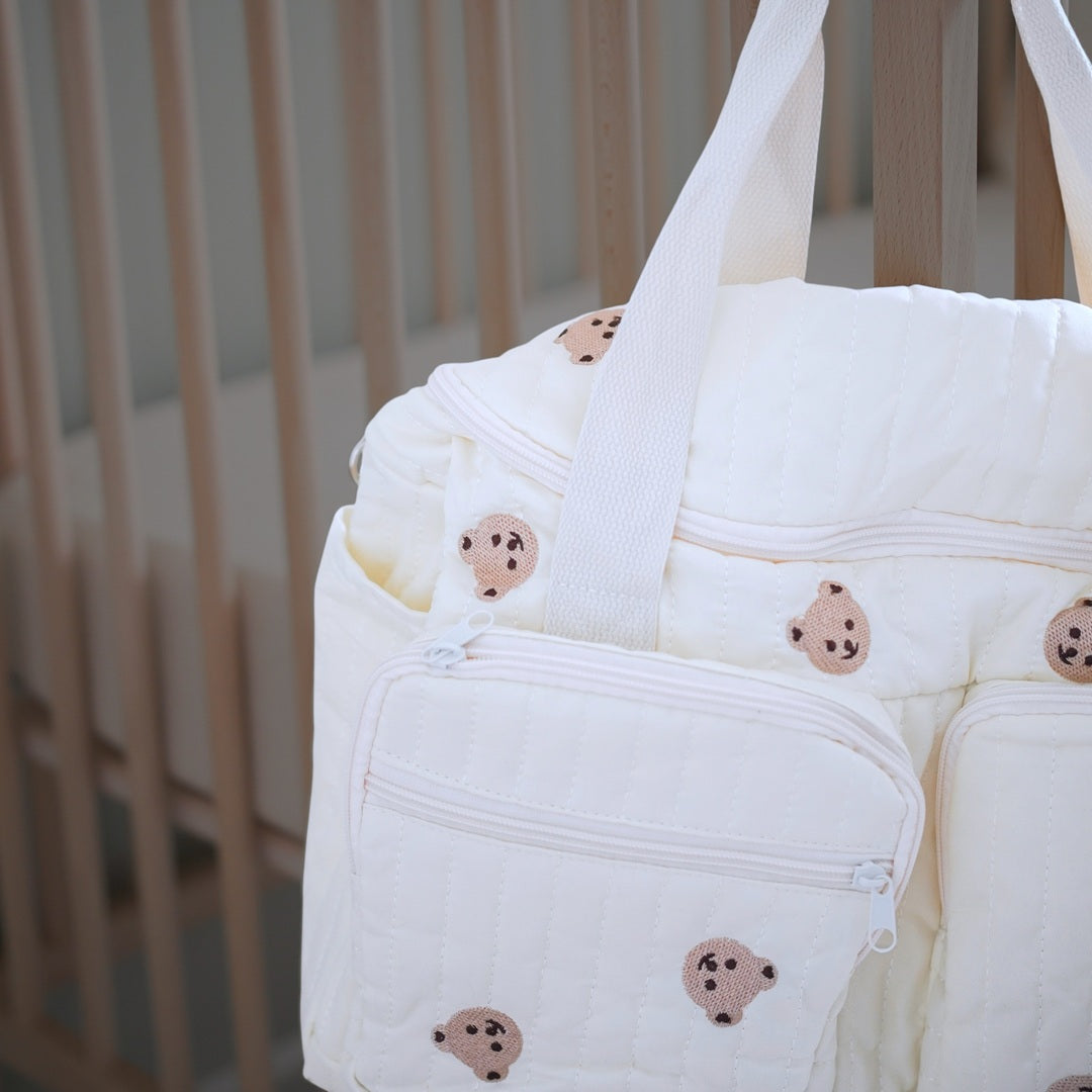 Stroller-friendly quilted diaper tote with teddy accents