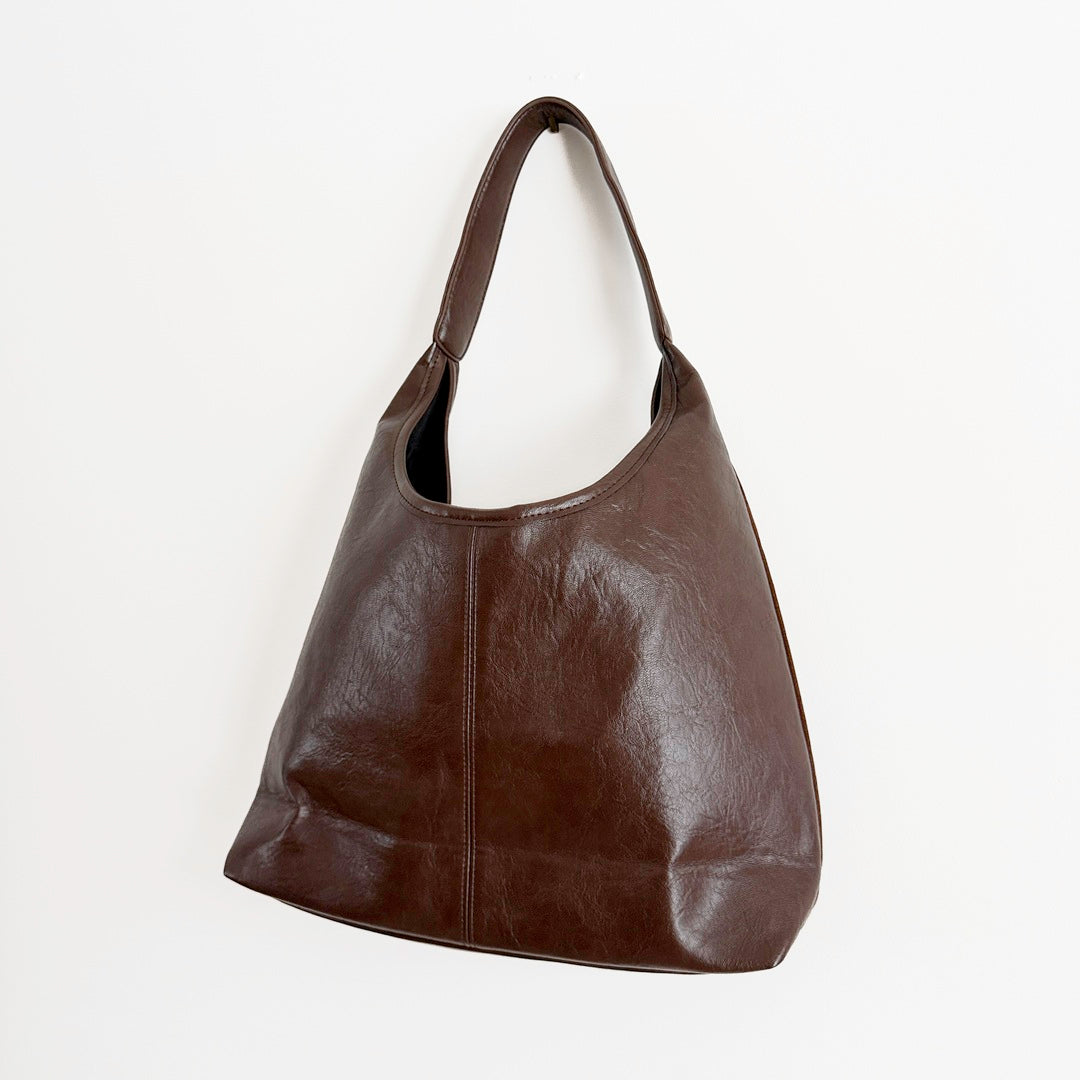 Women’s leather and suede shoulder bag