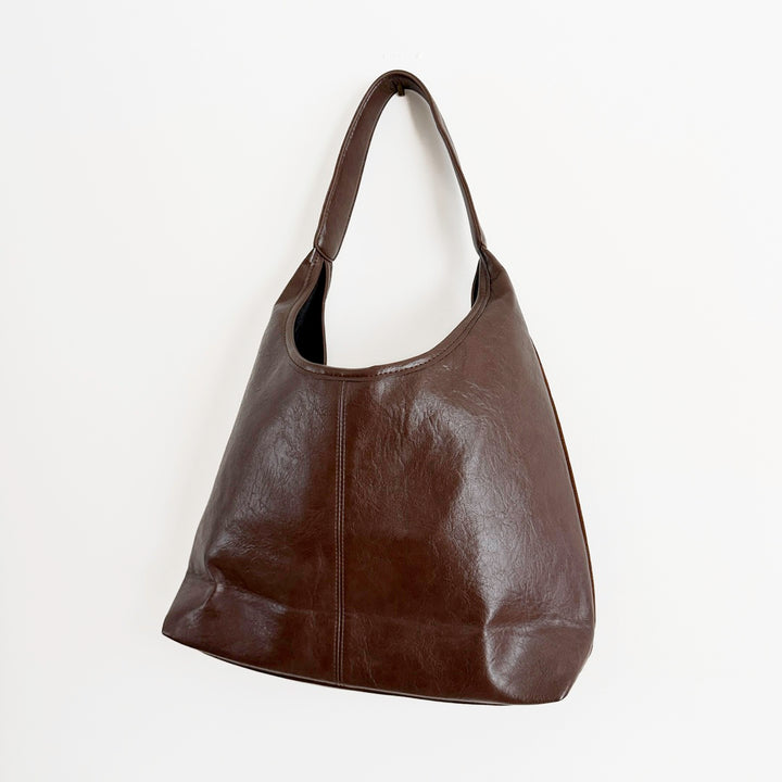 Women’s leather and suede shoulder bag