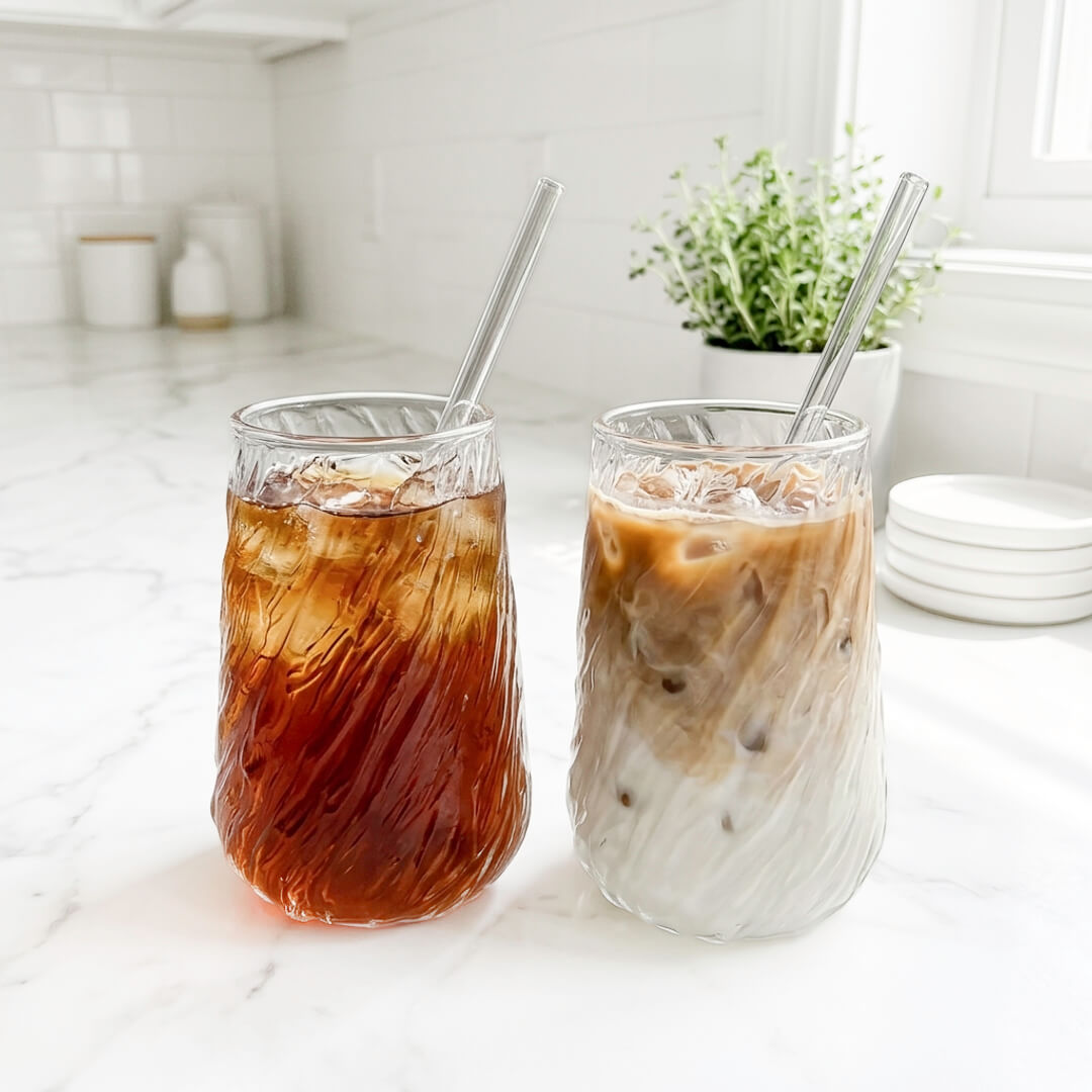 Clear swirl pattern drinking glasses with reusable straws