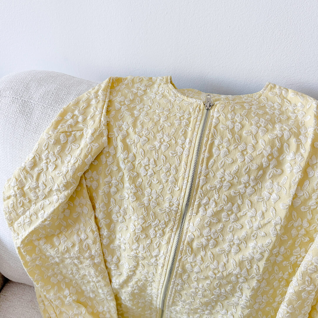 Women's zip-up jacket with delicate raised floral details