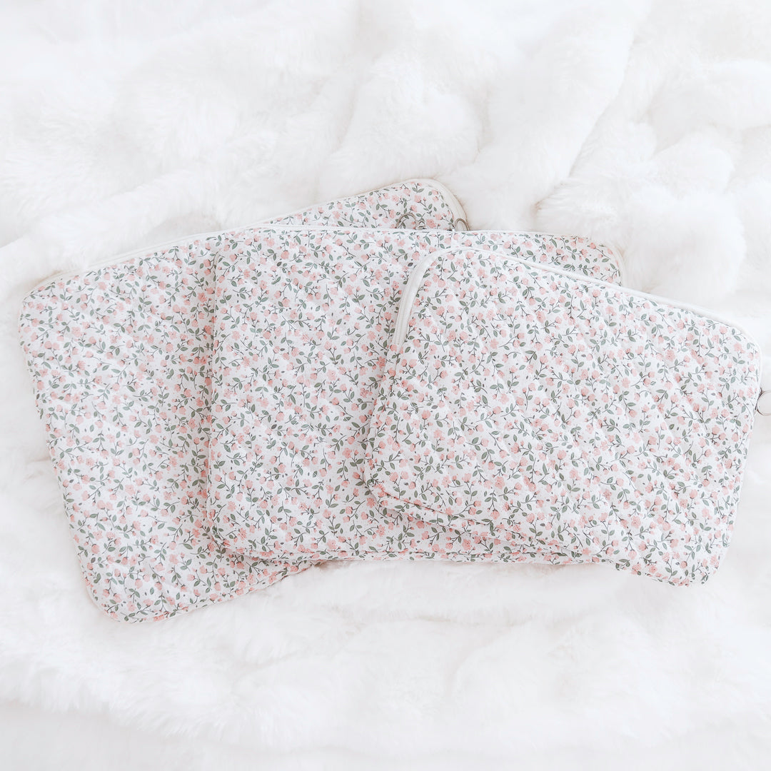 Three-piece floral laptop sleeve set in soft pink print