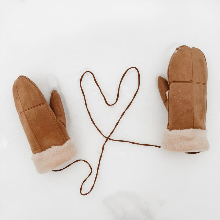 Tie-on winter mittens designed to keep hands warm