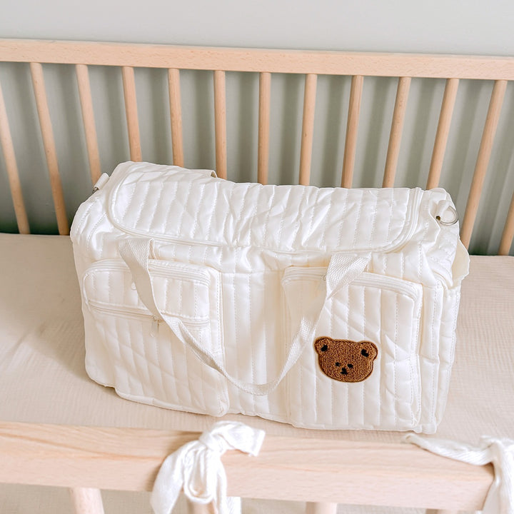 Soft quilted diaper bag for moms with cute teddy bear details