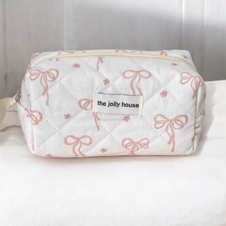 The Jolly House cosmetic bag with pink bows