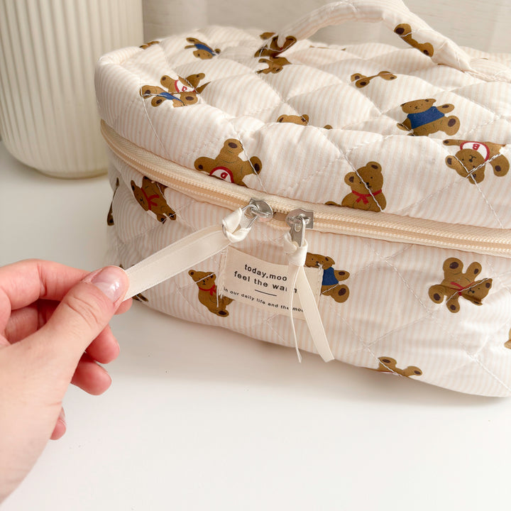 Neutral teddy cosmetic organizer with quilted fabric