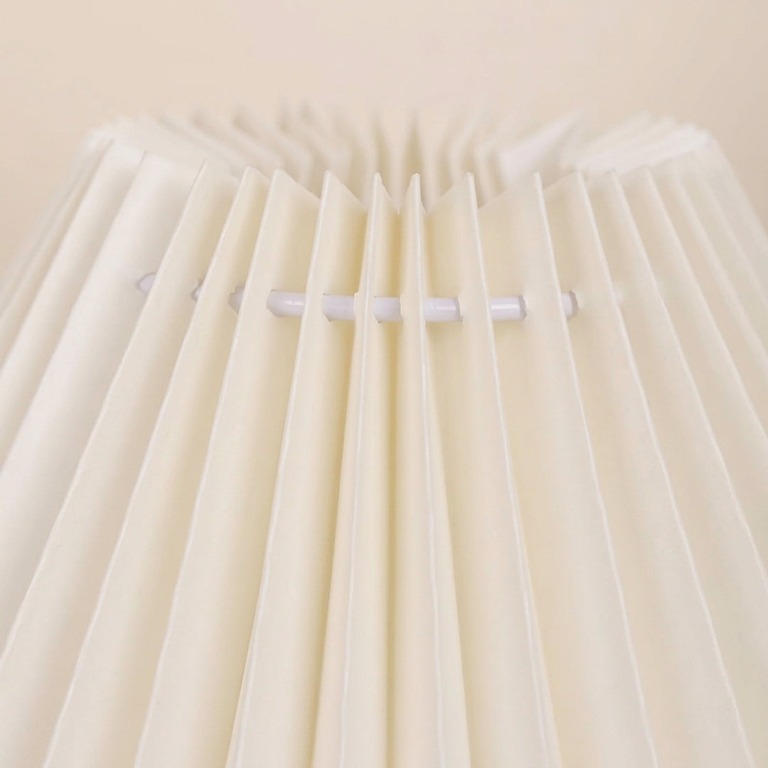 Compact pleated table lamp for living rooms and console tables
