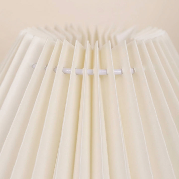 Compact pleated table lamp for living rooms and console tables