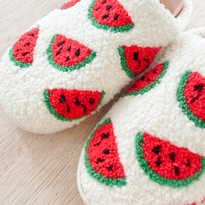 Plush indoor slippers with playful watermelon pattern