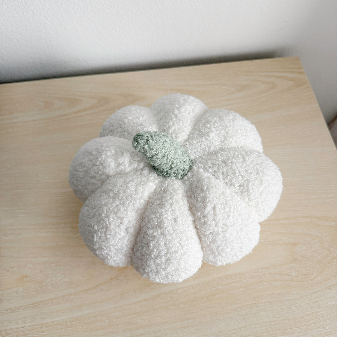 White pumpkin decor with textured finish and rounded pumpkin shape