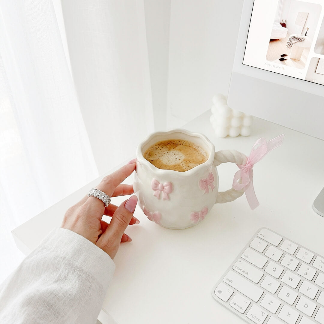Pink bow ceramic mug with curved handle
