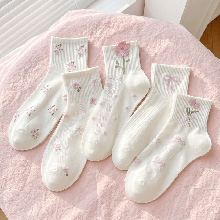 Women's white crew socks with delicate floral embroidery