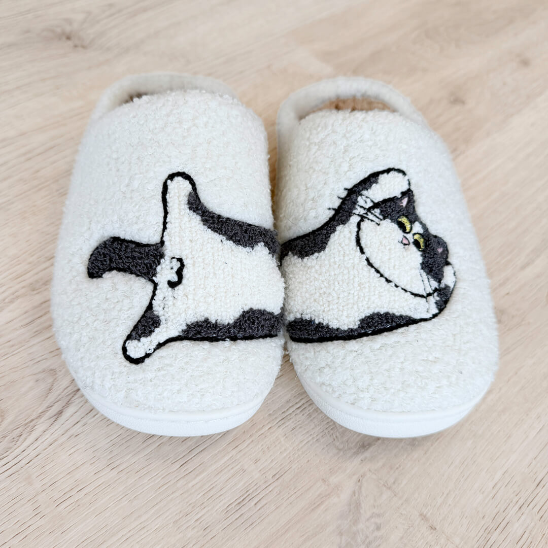 Cute house slippers with black and white cat design