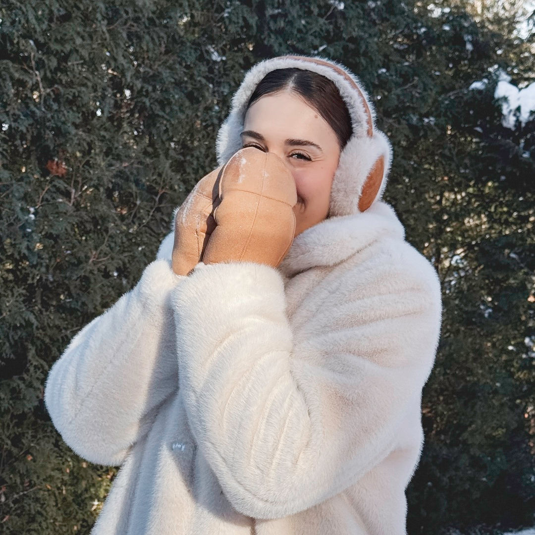 Soft fur earmuffs providing cozy ear protection