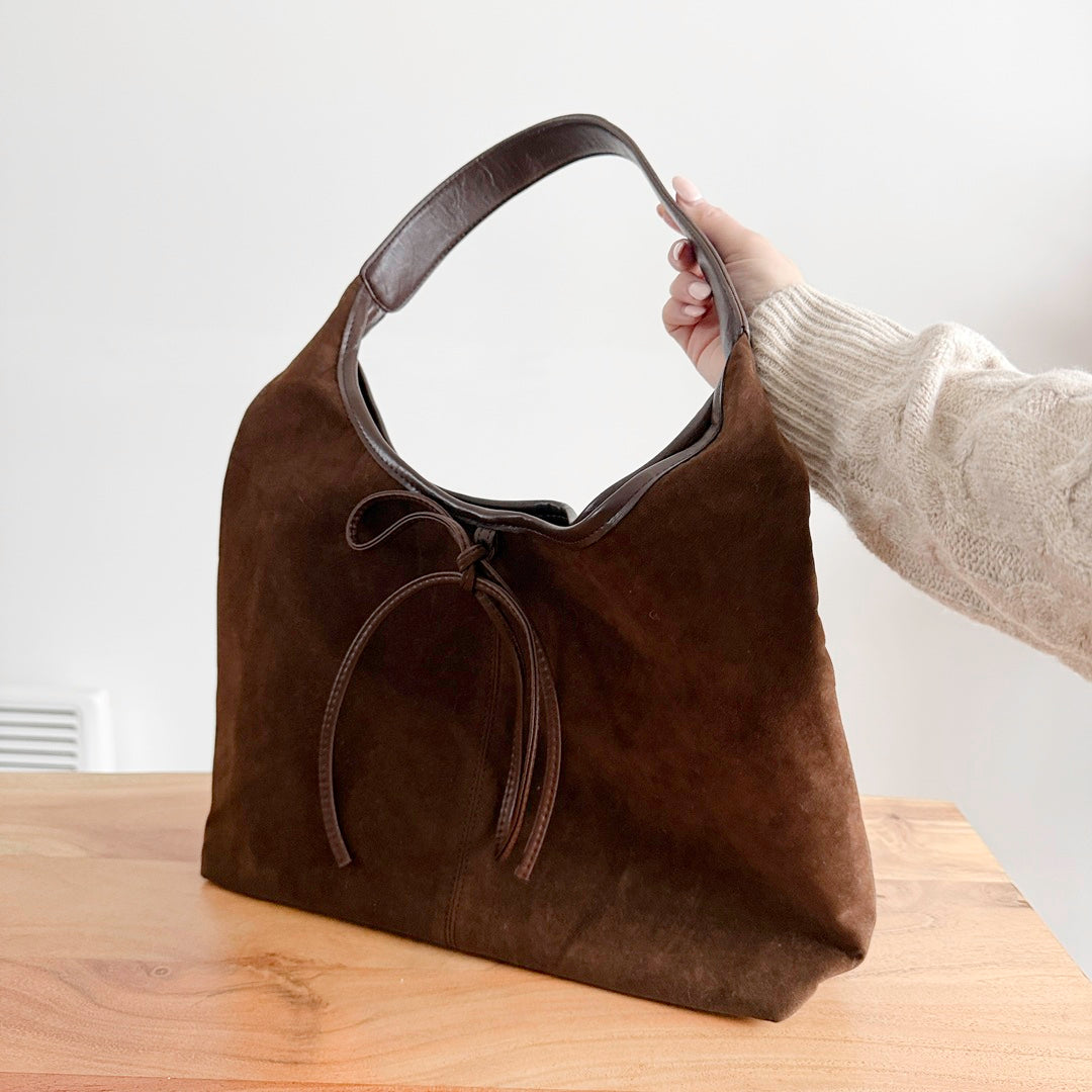 Women’s suede bow handbag with classic over shoulder strap