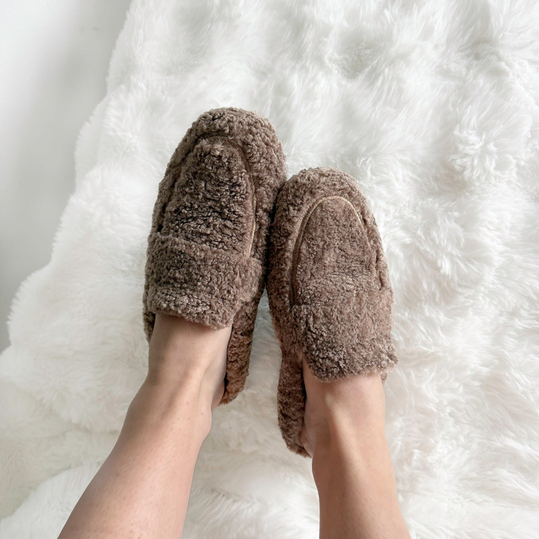Soft indoor slippers with warm faux fur interior