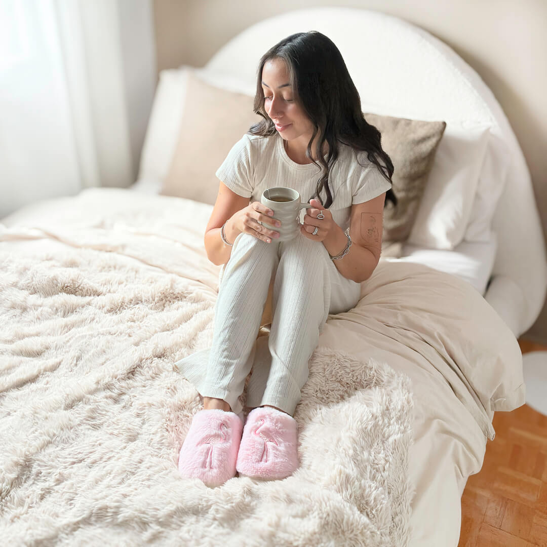 Pink indoor slippers with cute flamingo detail