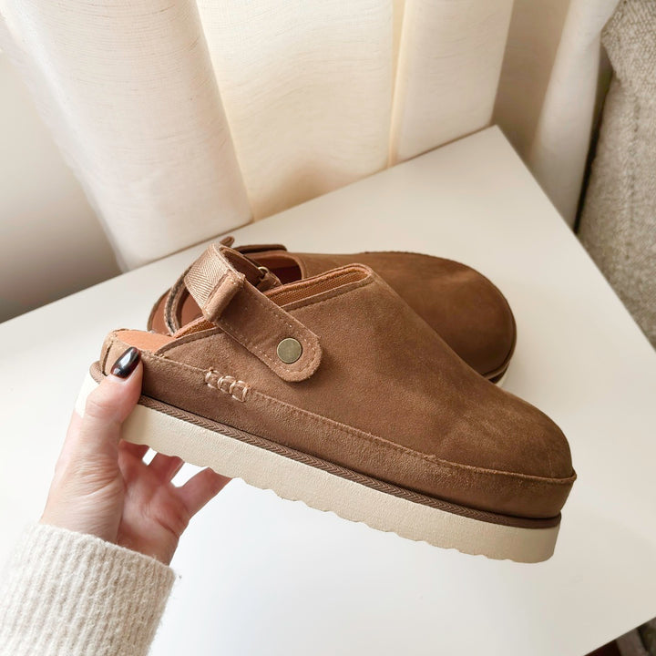 Neutral suede clogs with chunky sole for modern casual style