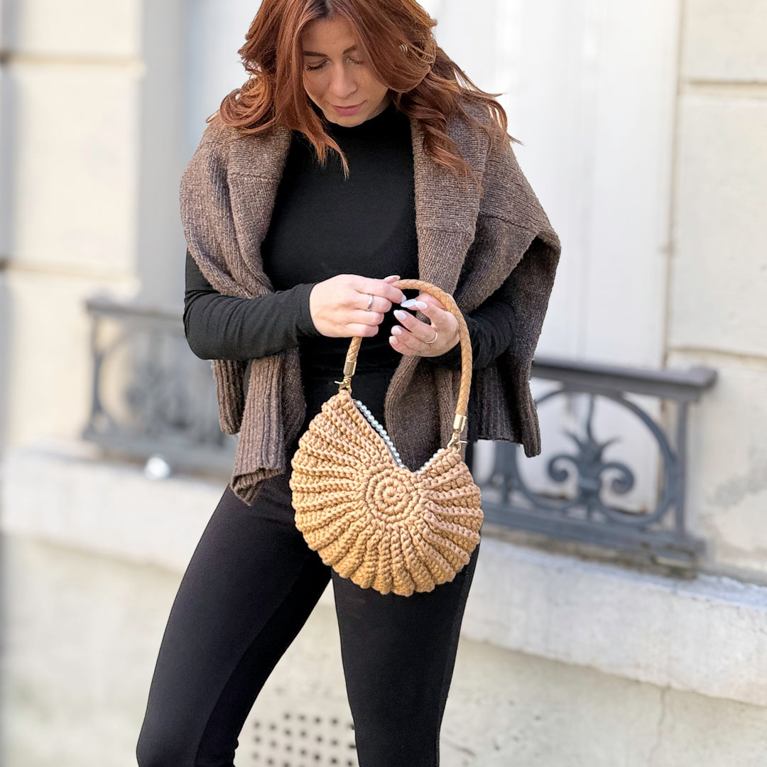 shell handbag with natural texture and elegant pearl accent