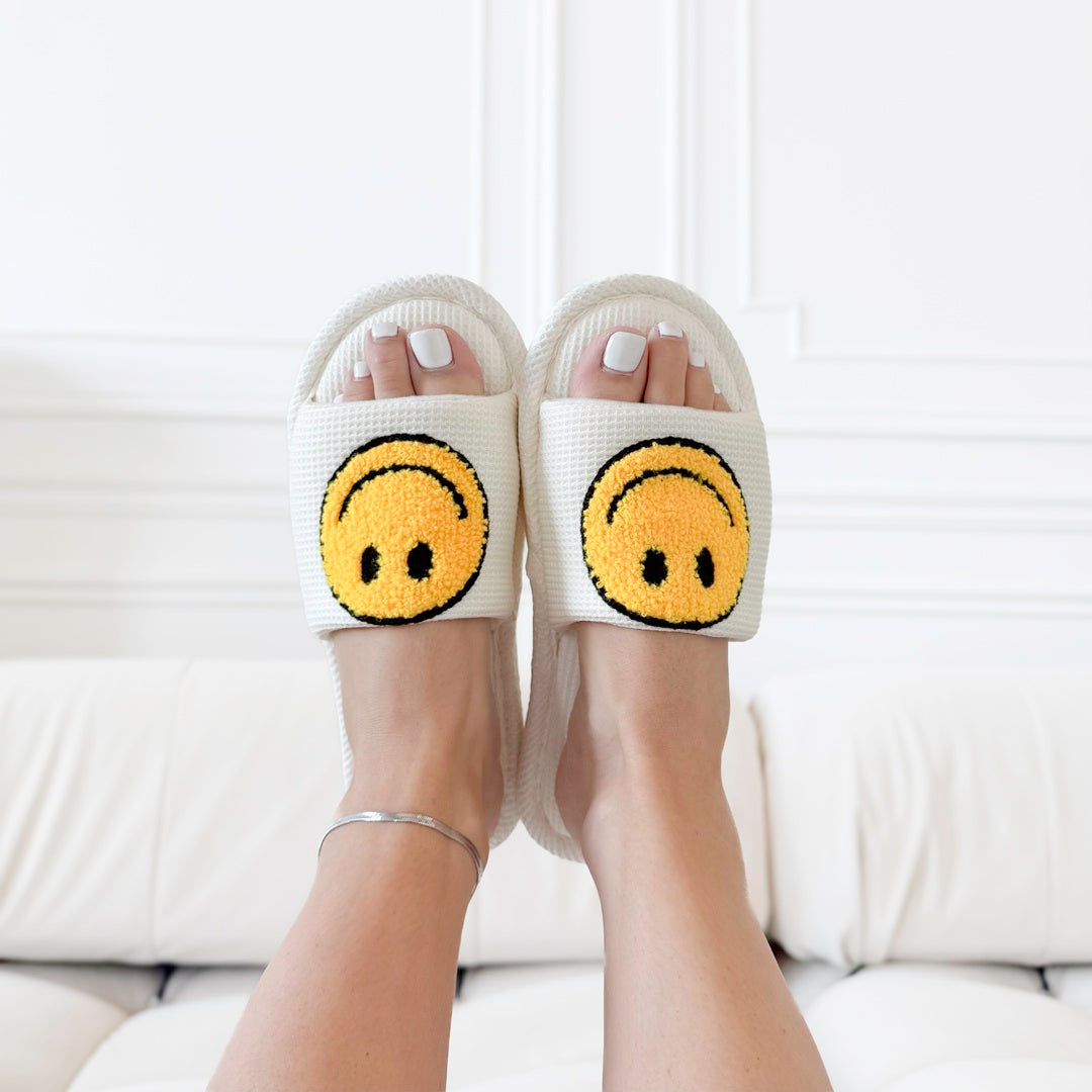yellow happy face slides
